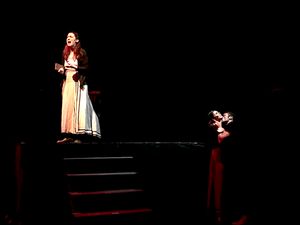 Dianna Graham (Ana), Ellie Smith (Gretchen), and Cooper Howell (Johann Faustus) in wo Photo