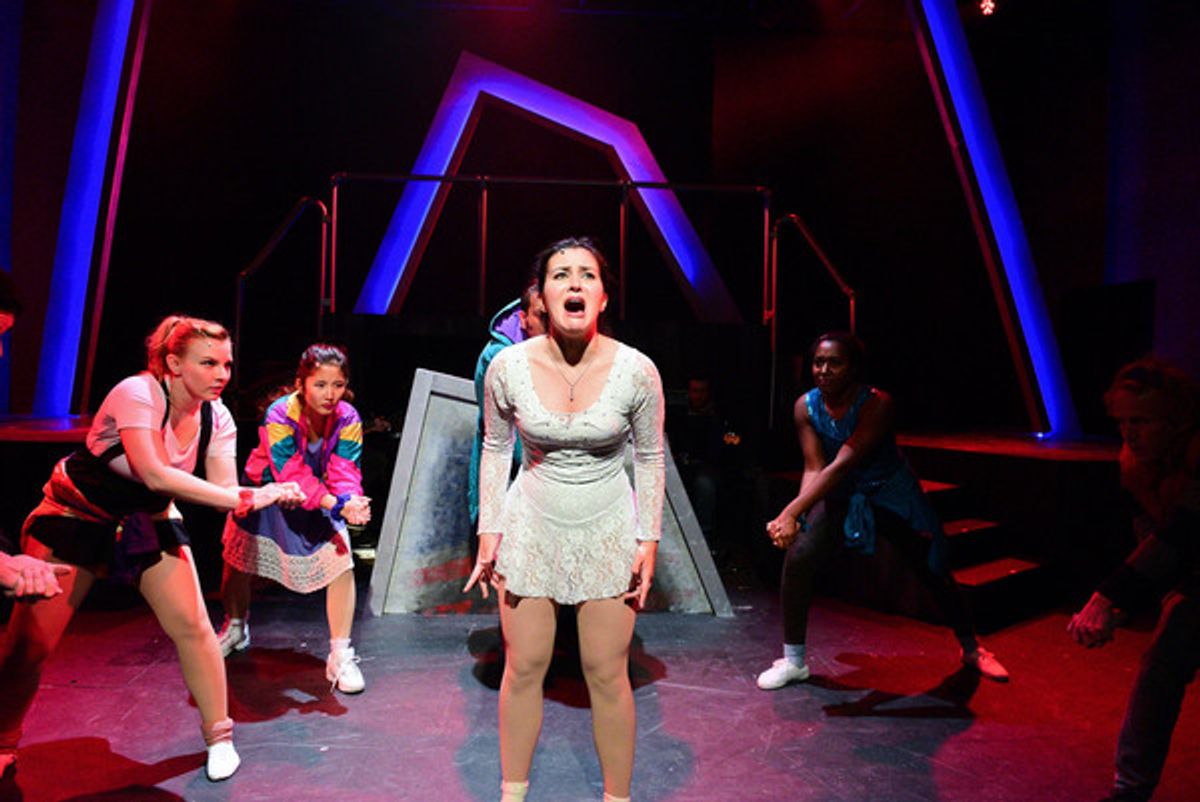(center) Courtney Mack with (back, l to r) Genevieve Perrino, Mari Uchida, Vasily Deris, Tyler SymonÃ¨ and Caleb Baze in Underscore Theatre Companyâ€™s Chicago premiere of TONYA AND NANCY: THE ROCK OPERA. Photo by Evan Hanover. at 