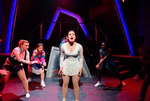 (center) Courtney Mack with (back, l to r) Genevieve Perrino, Mari Uchida, Vasily Deris, Tyler Symonè and Caleb Baze in Underscore Theatre Company’s Chicago premiere of TONYA AND NANCY: THE ROCK OPERA. Photo by Evan Hanover. @ BroadwayWorld (center) Courtney Mack with (back, l to r) Genevieve Perrino, Mari Uchida, Vasily Der Photo
