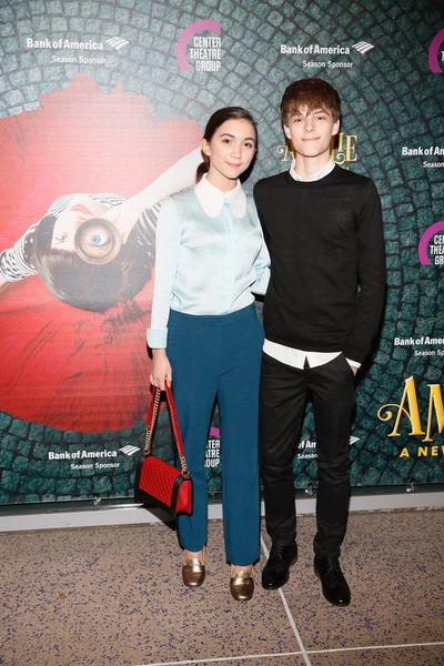 From left, actors Rowan Blanchard and Corey Fogelmanis arrive for the opening night p Photo