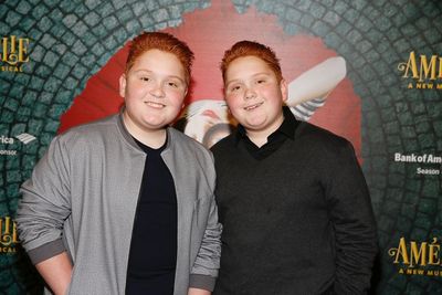 From left, actors Matthew and Benjamin Royer arrive for the opening night performance Photo