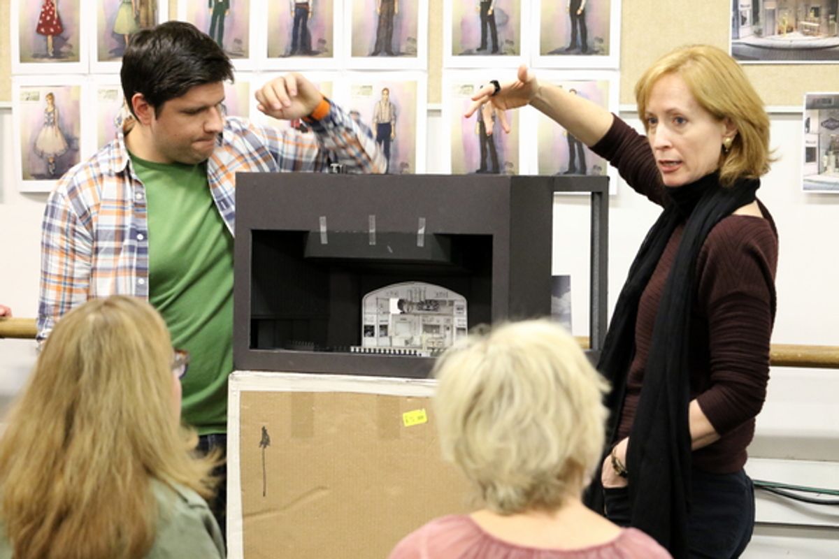  Kyle Longwell and  Susan V. Booth explain the set at 