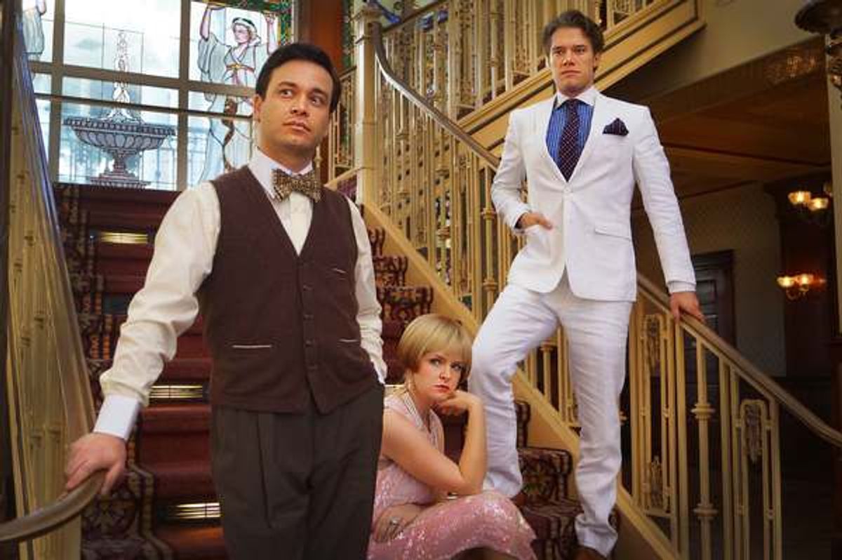 Buddy Haardt as Nick Carraway, Kathryn Miller as Daisy Buchanan, and Matthew Goodrich as Jay Gatsby star in Orlando Shakespeare Theaterâ€™s production of The Great Gatsby. Photo by Luke Evans taken at The Ballroom at Church Street. at 