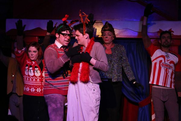 (center) Rudolph (Grant Drager) learns a musical lesson the hard way with (left to ri Photo