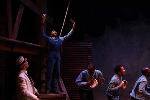 (Standing on box) Cameron Goode as Eugene Williams in Porchlight Music Theatreâ€�&iquest;� Photo