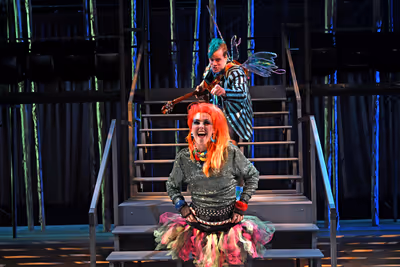Front center: Rachael Warren as Puck, back center: Teddy Lytle as a fairy Photo
