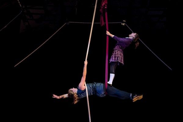 Sadie Sims and Maggie Stone perform on aerial silk sling and Spanish web Photo