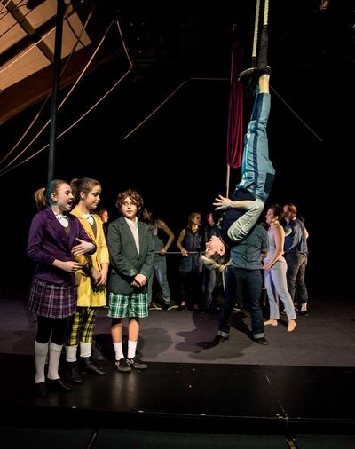Upside down Amanda Crockett (L to R) Sadie Sims, Emerson Catlin and Ezra Danzig Photo