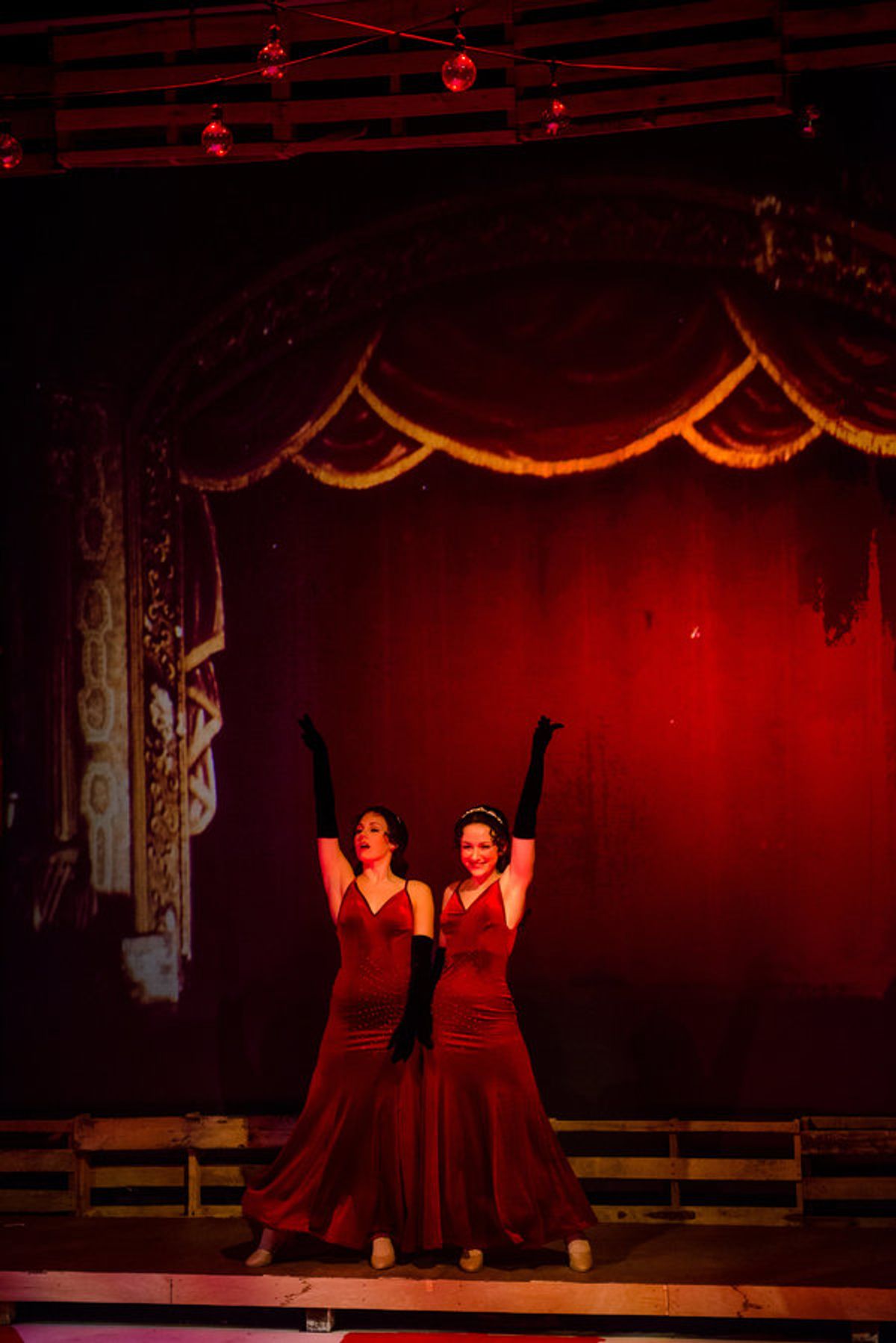 The Hilton Sisters (Jenna Pastuszek, Ashley Sweetman) perform on stage at 