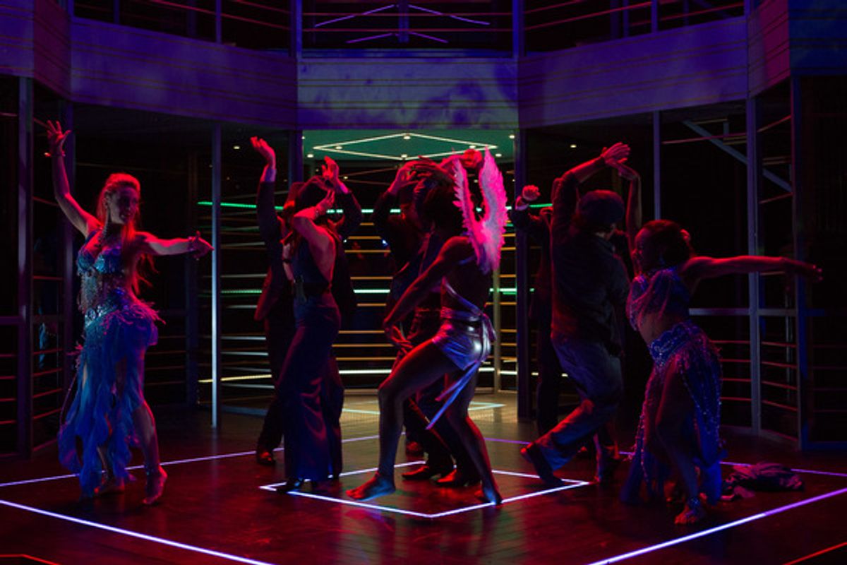 Guests of Timon enjoying themselves in Folger Theatre's production of Shakespeare's TIMON OF ATHENS at 