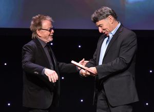 LOS ANGELES, CA - MAY 16: Honoree Stephen Schwartz accepts the Founder's Award from ASCAP President Paul Williams onstage at the 2017 ASCAP Screen Music Awards at The Wiltern on May 16, 2017 in Los Angeles, California. (Photo by Lester Cohen/Getty Image @ BroadwayWorld LOS ANGELES, CA - MAY 16: Honoree Stephen Schwartz accepts the Founder's Award from Photo