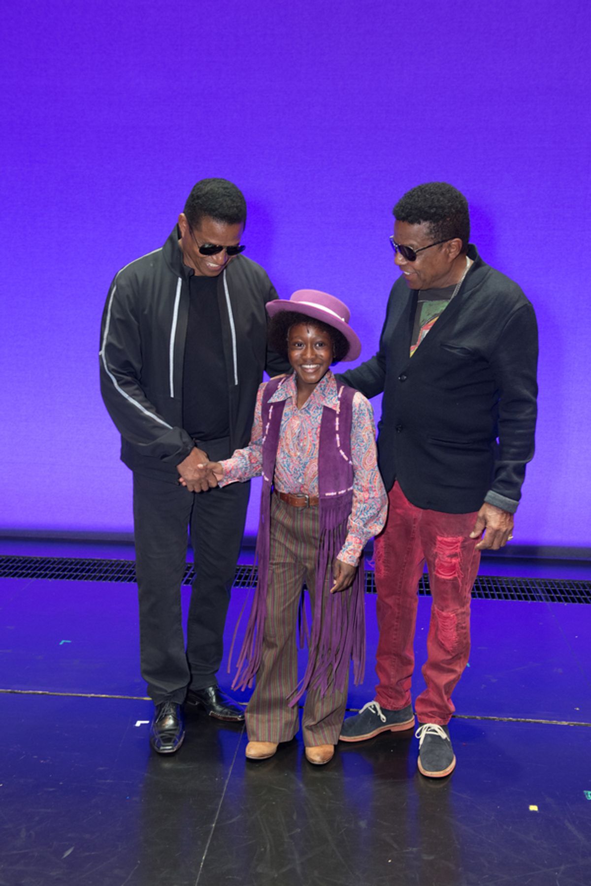 Jackie Jackson, Raphael Higgins-Humes, and Tito Jackson at 