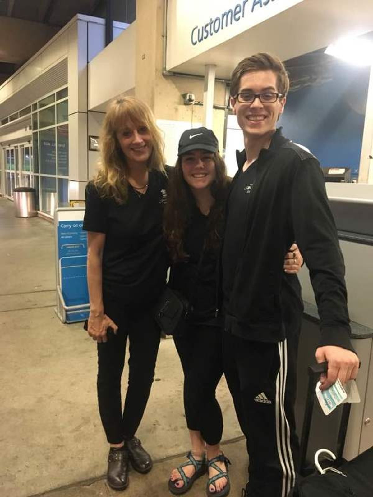 John and Shelby at the airport with their NHSMTA chaperone, Tina Walsh.
 at 