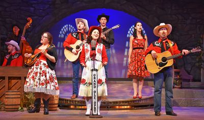  The cast of Ring of Fire sings â€œOh Come Angel Bandâ€ in Beef & Boards Din Photo