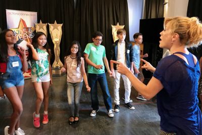 Teens group at Actors Connection Performing Arts Camp train in movie musicals with Br Photo