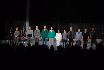 The cast during the curtain call for the opening night performance of "The Curious In Photo