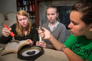 Three teen friends attempt to conjure spirits in a secret midnight ceremony, in â€ Photo