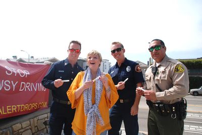 Alison Arngrim with Members of LA County Fire Dept, station 70 and LA County Sheriffs Photo