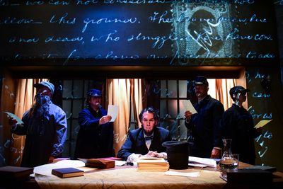Lawrence Grimm and the cast Photo