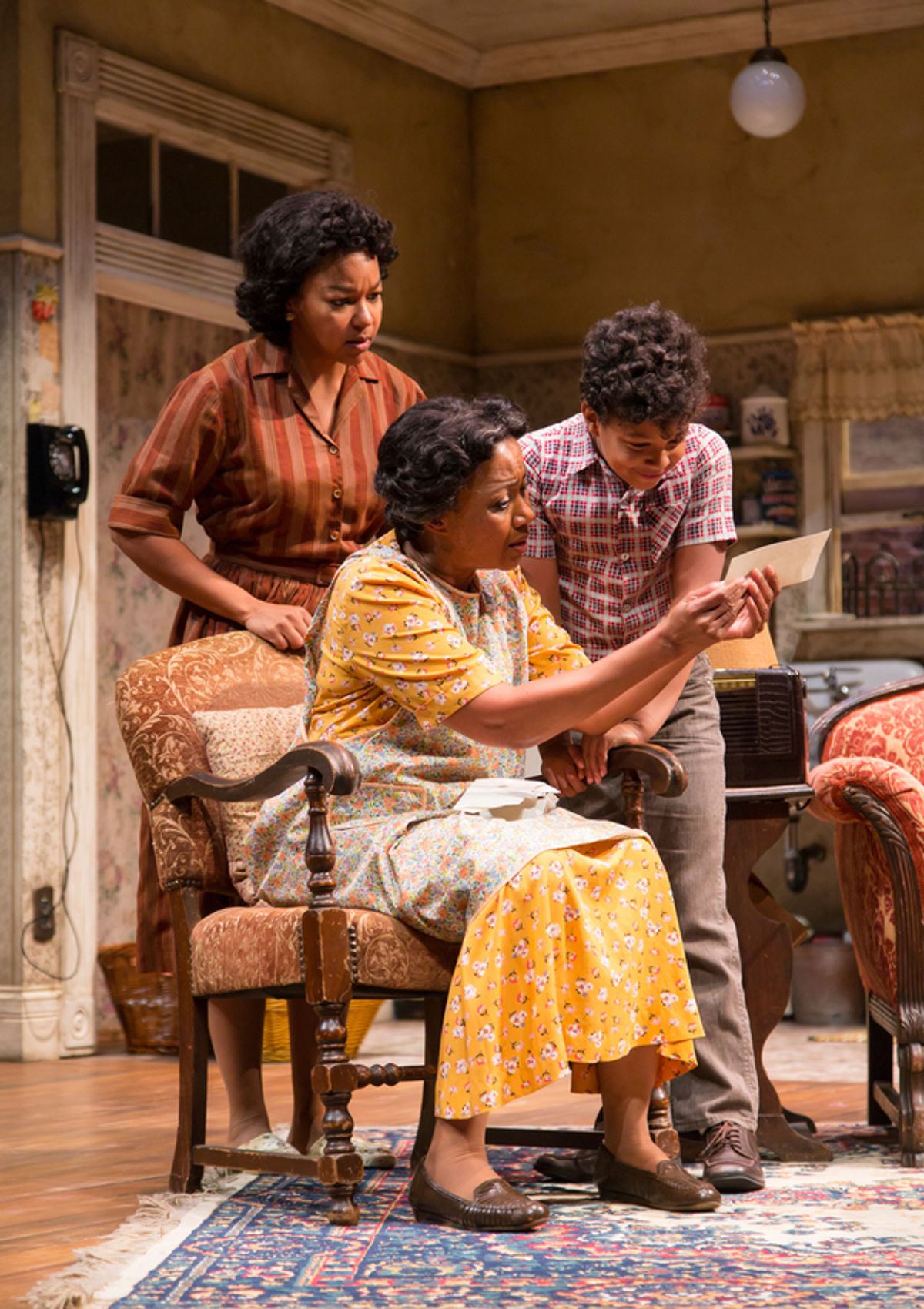 Crystal A. Dickinson (Ruth Younger), Brenda Pressley (Lena Younger) and Owen Tabaka (Travis Younger) in A Raisin in the Sun at Two River Theater.  at 