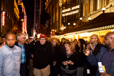 Michael Moore and audience Photo