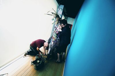 Machine Dazzle installing a mannequin at Nieman Marcus Photo