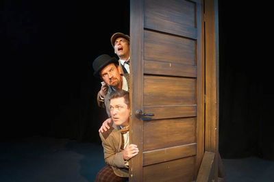 Steven Lane as Sherlock Holmes, Simon Needham as Dr. Watson, and Chris Crawford as Si Photo