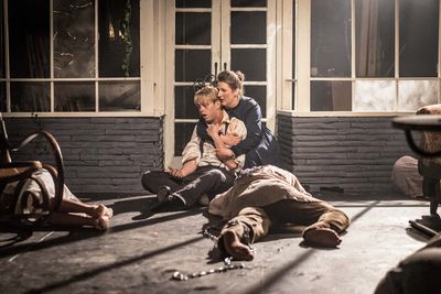 Micah Kronlokken and Marsha Harman with the cast Photo