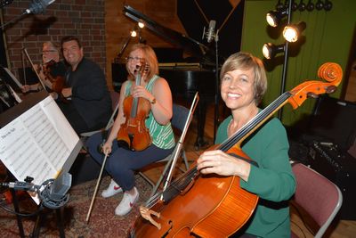 The String Section-Marshall Coid (Violin 1), Brad Busenbeck (Violin 2), Elizabeth Nie Photo