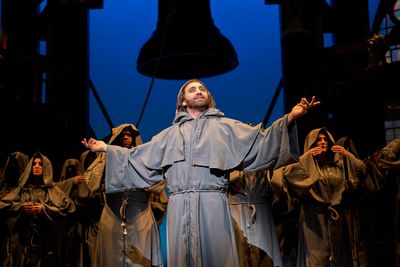 Clopin Trouillefou (actor, Alex Syiek*) sets the scene on the steps of Notre Dame Cat Photo