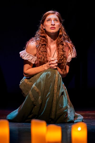 Esmeralda (Keri Rene Fuller*) prays that 'God Help the Outcasts'. Photo