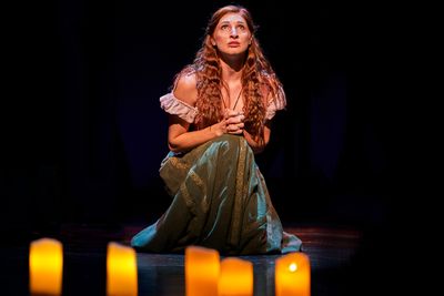 Esmeralda (Keri Rene Fuller*) prays that 'God Help the Outcasts'. Photo
