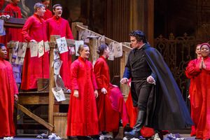  Scarpiaâ€™s cruel henchman Spoletta (Eric Ferring) storms into the church Photo