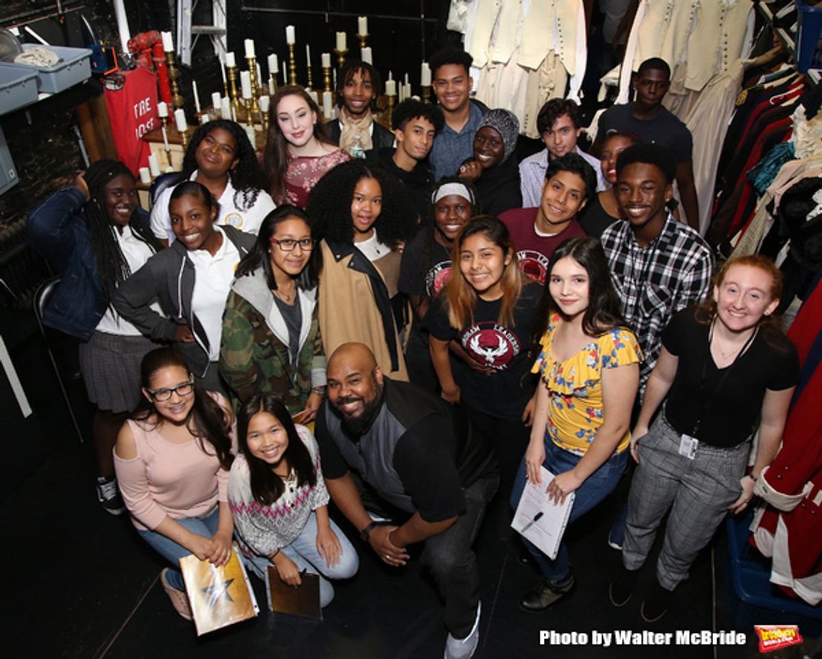 James Monroe Iglehart with student performers at 