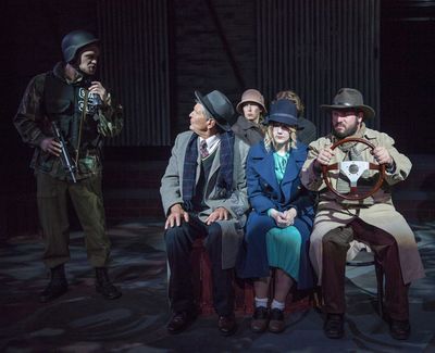 Left to right: A border patrol agent (Henri Boulanger) questions Doremus Jessup (Vic  Photo