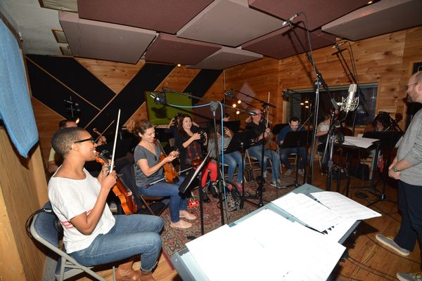 The string section that includes- Adda Kridler (Violin)m Tallie Brunfelt (Violing) Hi Photo