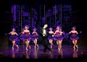 Danny Gardner as Bobby Child and the ensemble Photo