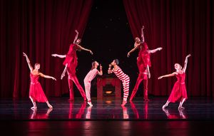 Smuin dancers Terez Dean and Mengjun Chen with the Company enjoy chestnuts roasting on an open fire in The Christmas Song, choreographed by Smuin dancer Erica Felsch, part of Smuin's annual The Christmas Ballet touring the Bay Area now through December 24 @ BroadwayWorld Smuin dancers Terez Dean and Mengjun Chen with the Company enjoy chestnuts roasting o Photo