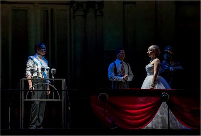 Robert Finlayson and Emma Kingston, with members of the company of EVITA Photo