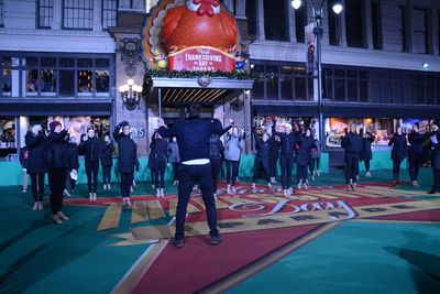 Jimmy Fallon wishing the Radio City Rockettes a good rehearsal Photo