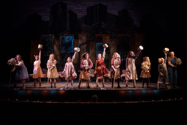 KyLee Hennes, center (Annie in SKY cast) performs with the SKY cast of Annie in… Photo