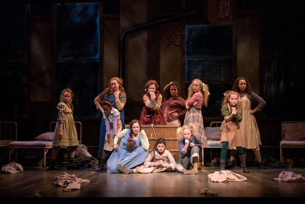 KyLee Hennes, center (Annie in SKY cast) performs with the SKY cast of Annie in… Photo