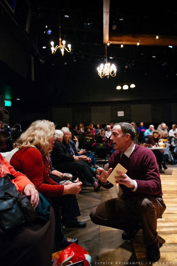 Mont Chris Hubbard plays music as Merideth Kaye Clark and Leif Norby gather winter me Photo