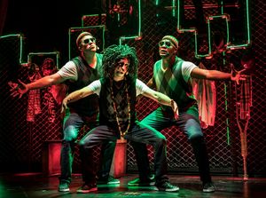 A Rastafarian Jacob Marley (JQ, center) and his crew of reggae spirits (left to right Photo