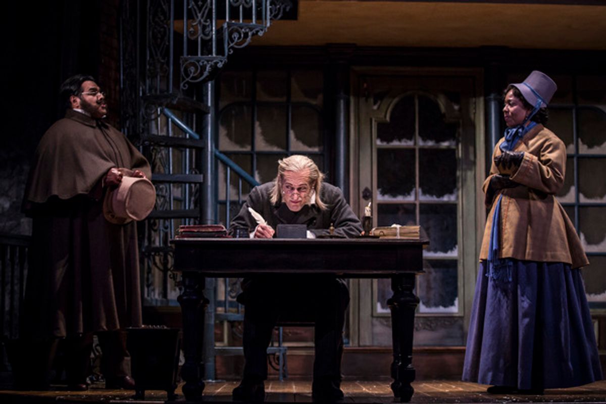 Jonah Winston (Ortle), Larry Yando (Ebenezer Scrooge) and Penelope Walker (Mrs. Crumb) at 