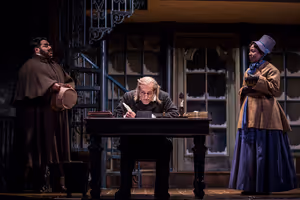 Jonah Winston (Ortle), Larry Yando (Ebenezer Scrooge) and Penelope Walker (Mrs. Crumb Photo