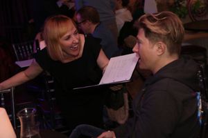 Kathy Searle gets words from the audience. Photo