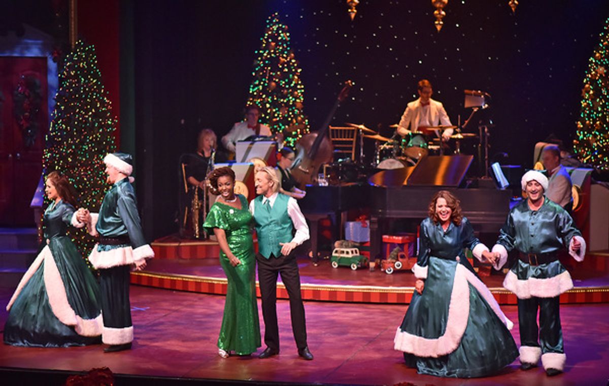 Backed by the Beef & Boards Orchestra, RenÃ©e Jackson and Kenny Shepard (center) join the Beef & Boards Quartet (from left) Marisa Rivera, Peter Scharbrough, Betsy Norton and Kyle Durbin in a rousing rendition of â€"Rocking Around The Christmas Treeâ€ in at 