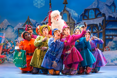 Ken Clement as Santa and the cast of ELF THE MUSICAL Photo