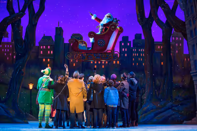 Ken Clement as Santa and the cast of ELF THE MUSICAL Photo